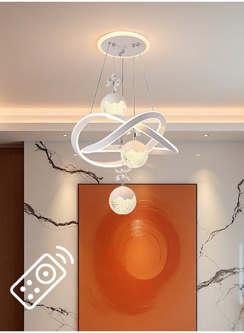 An LED chandelier decorated with crystals, with three adjustable lighting colors, controlled by remote control/switch, adjustable in height, suitable for above the dining table, bedroom, study, and living room. - Image 1